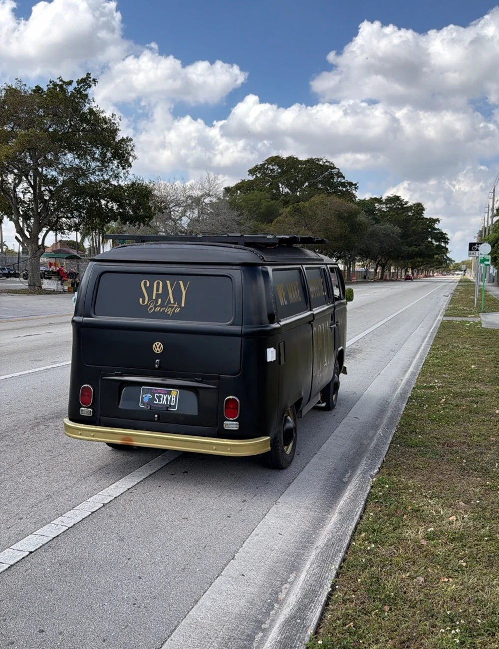 Rear view of the Sexy Barista coffee truck driving in Miami